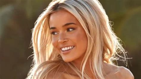 Olivia Dunne models white bikini as a Rookie in 2024 SI Swimsuit。